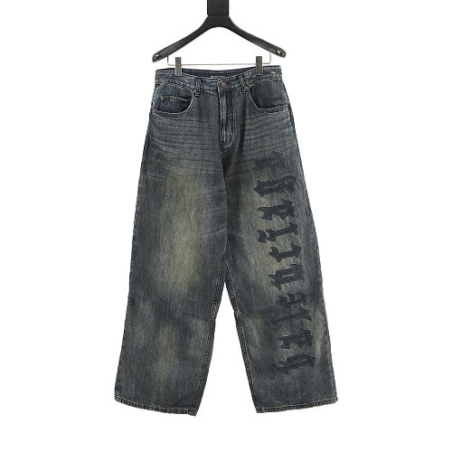 Balenciaga Distressed Loose-Fit Jeans with Leg Patch Detail